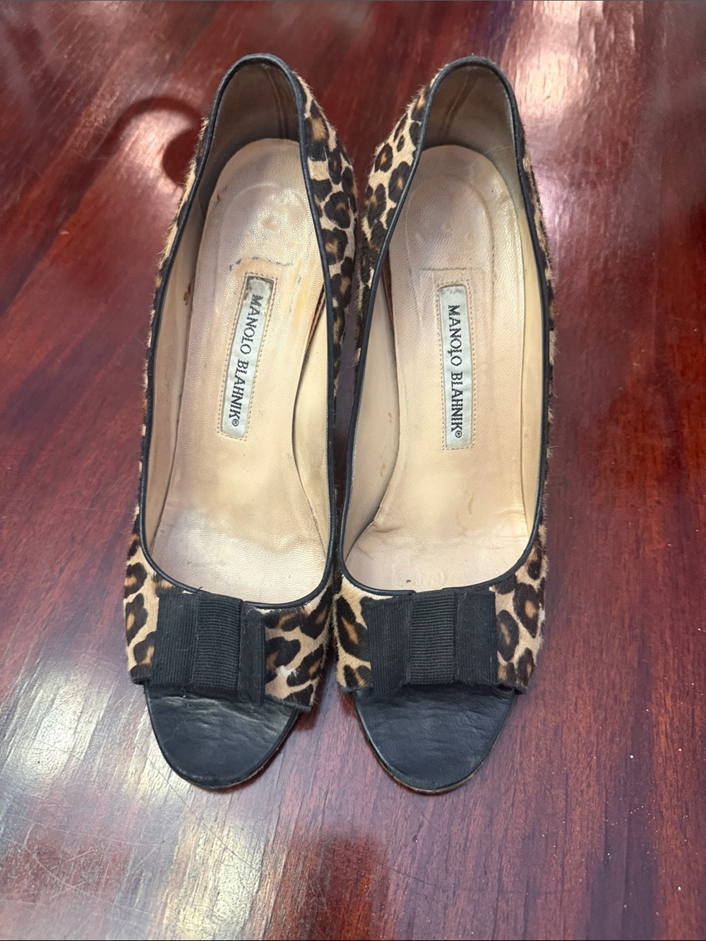 Manolo Blahnik Leopard Print Peep-Toe Pumps with Black Bow